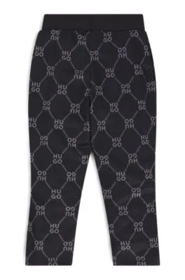 Pantalones de chándal loose fit para niños con logo apilado estampado