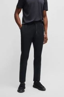 Pantalones de chándal regular fit en tejido de secado rápido