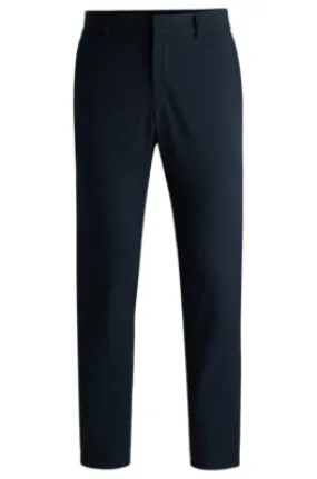 Pantalones de corte moderno en tejido elástico técnico antiarrugas