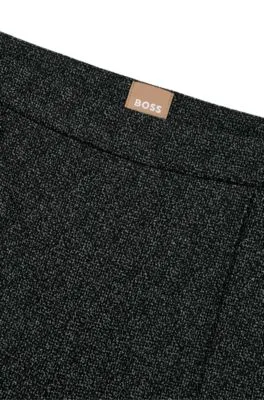 Pantalones slim fit de talle alto en punto elástico