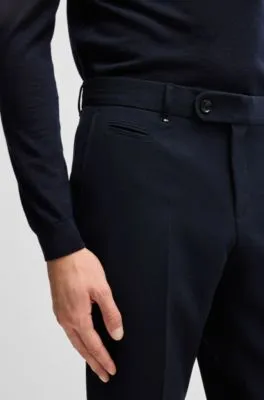 Pantalones slim fit en piqué elástico con microdibujo