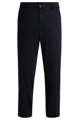 Pantalones tapered fit de tiro medio en sarga elástica