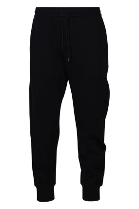 Pantalón de chándal negro con lineas laterales y minilogo