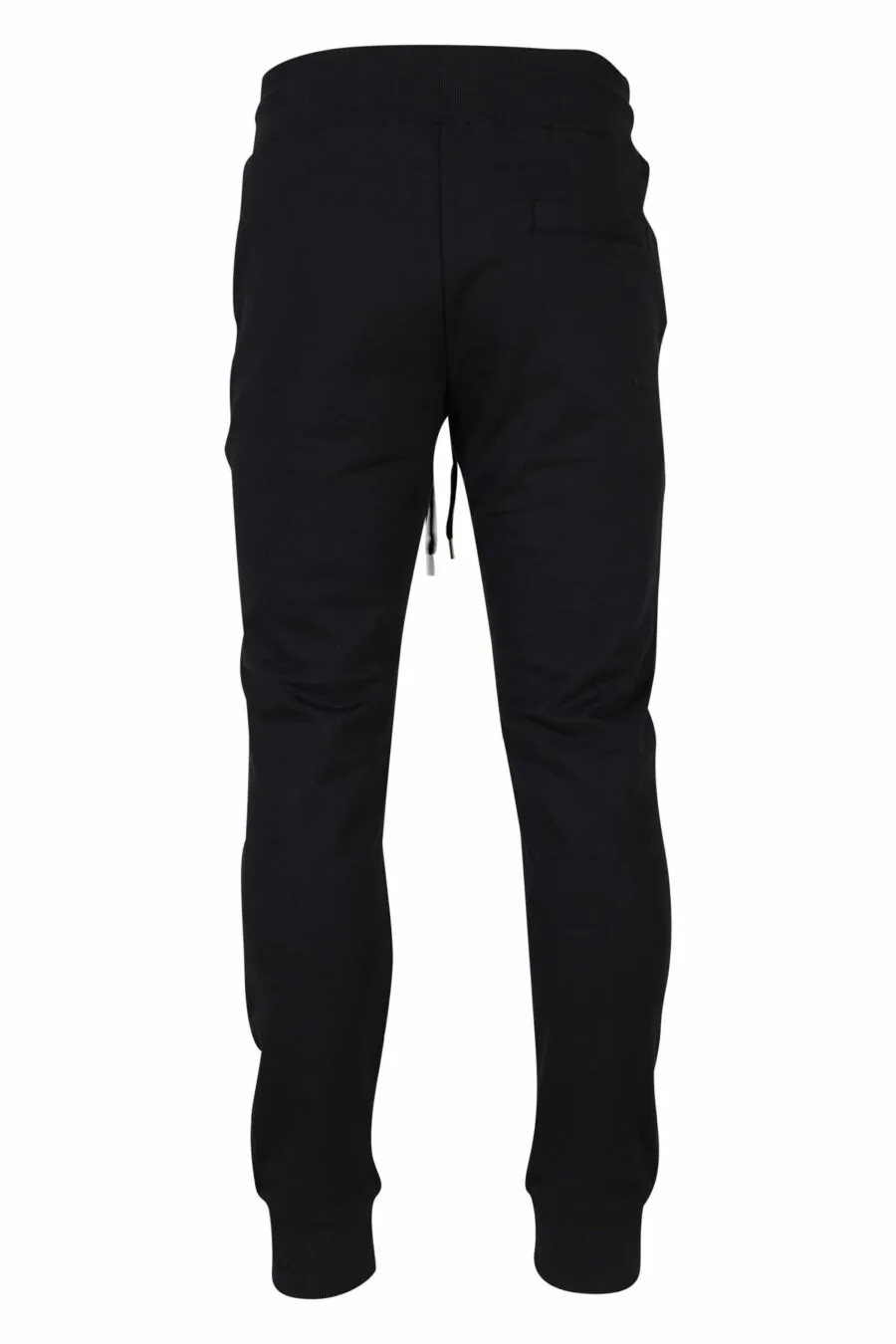 Pantalón de chándal negro con minilogo circular dorado